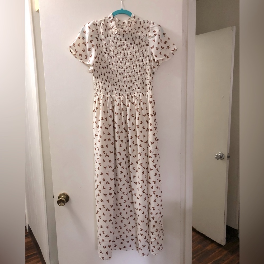 Autumn dress with falling leaves